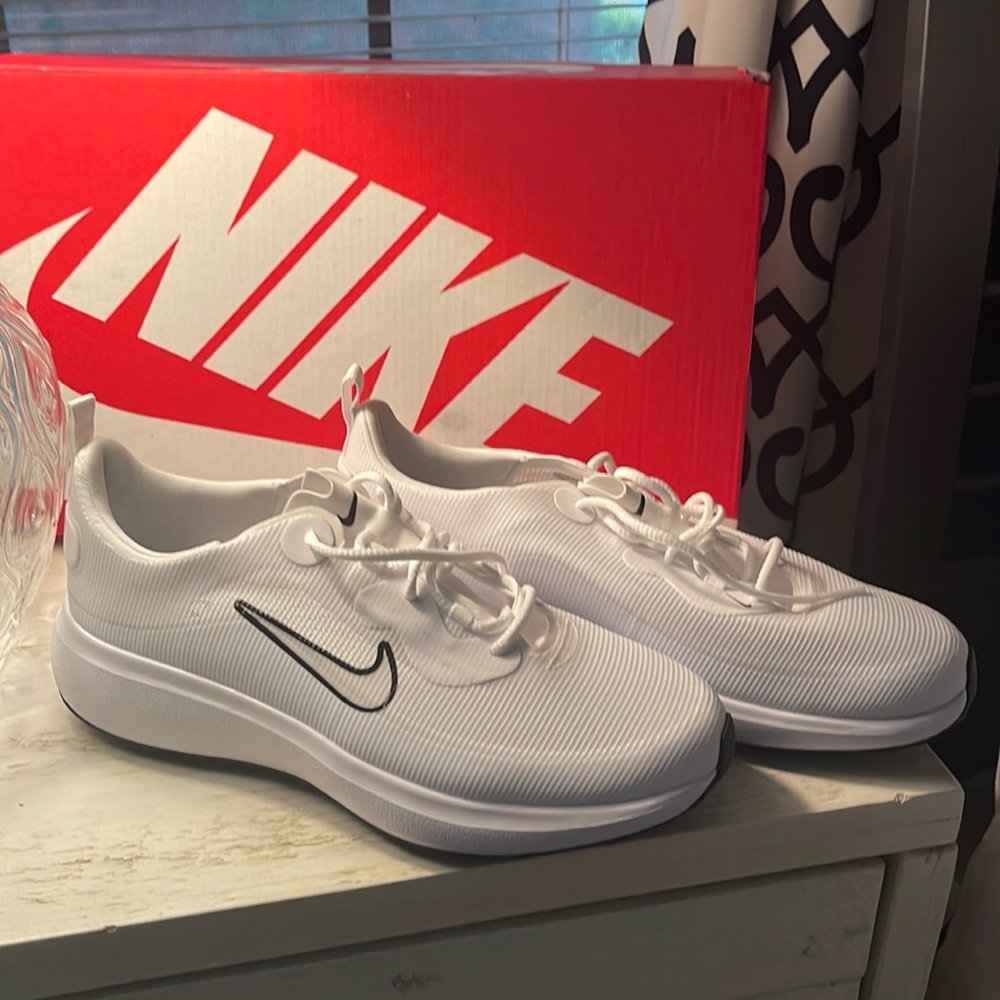 Brand new, never worn Black and White Nike Golf shoes with mesh for max airflow